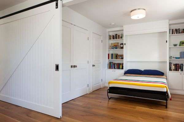 Sliding-door-and-Murphy-bed-create-a-bedroom-out-of-an-open-niche
