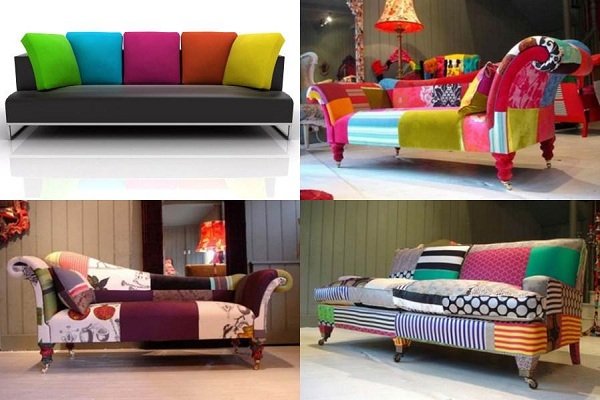 Black sofa with colour pillows on white background