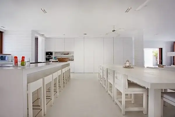all-white-kitchen-and-dining-area.webp