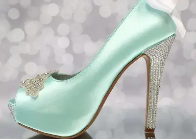 Aqua-Blue-Wedding-Shoes-Silver-Crystal-Heel-Rhinestone-Applique-White-Bow-Save-The-Date-400x284.webp