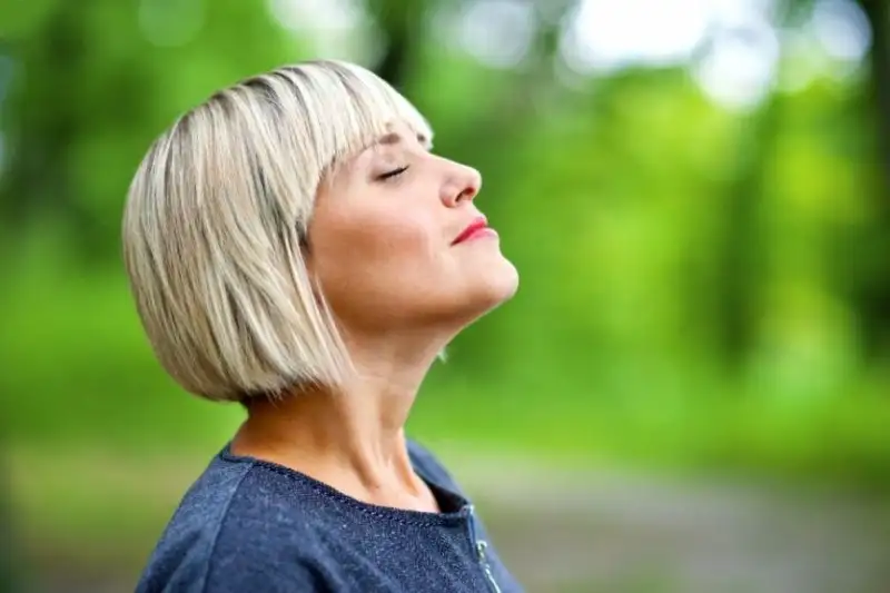 attractive-woman-breathing-and-relaxing-e1453568898299.webp