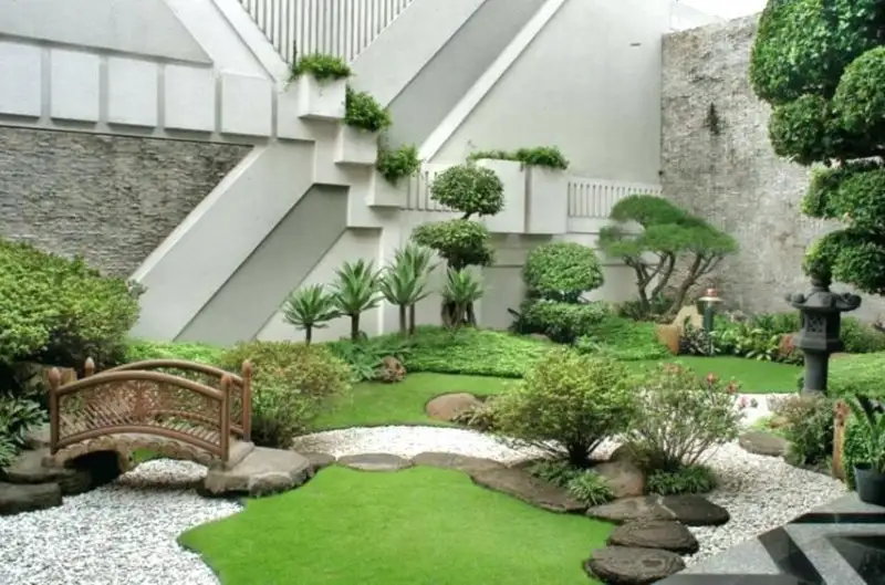 backyard-zen-garden-condo-zen-common-areas-backyard-zen-rock-garden.webp