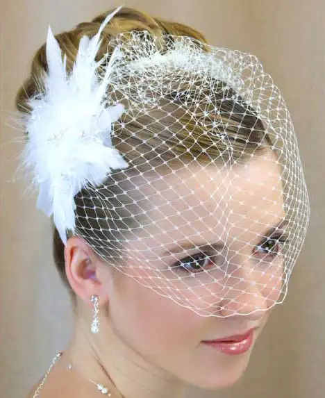 birdcage-veil-with-feather.webp