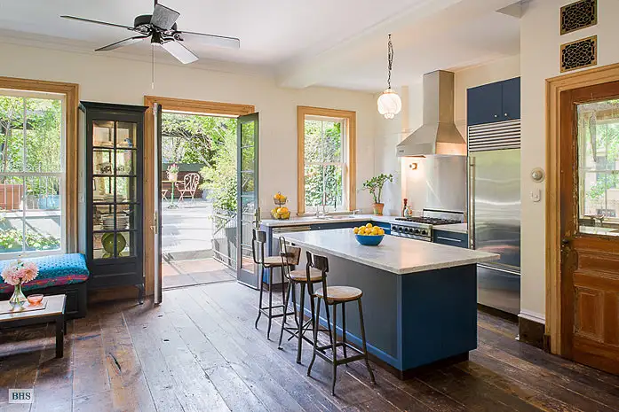 deluxe-kitchen-area-features-walk--pantry-has-direct.webp