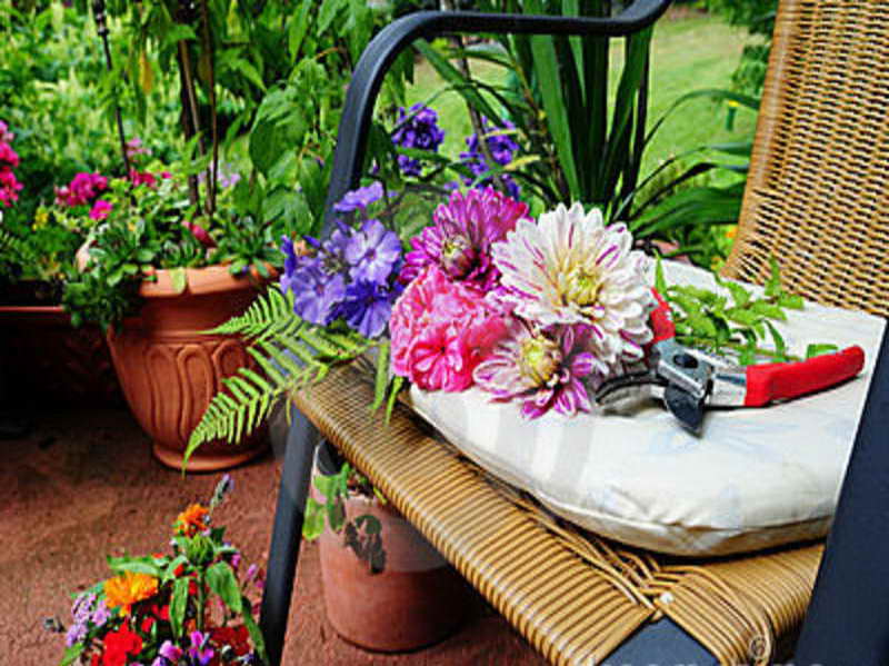 Gardening-Flower-Pots-Decoration-Ideas-with-wricker-chair.jpg