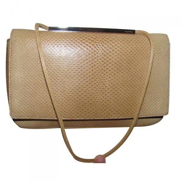 gucci-beige-exotic-leather-clutch-bag.webp