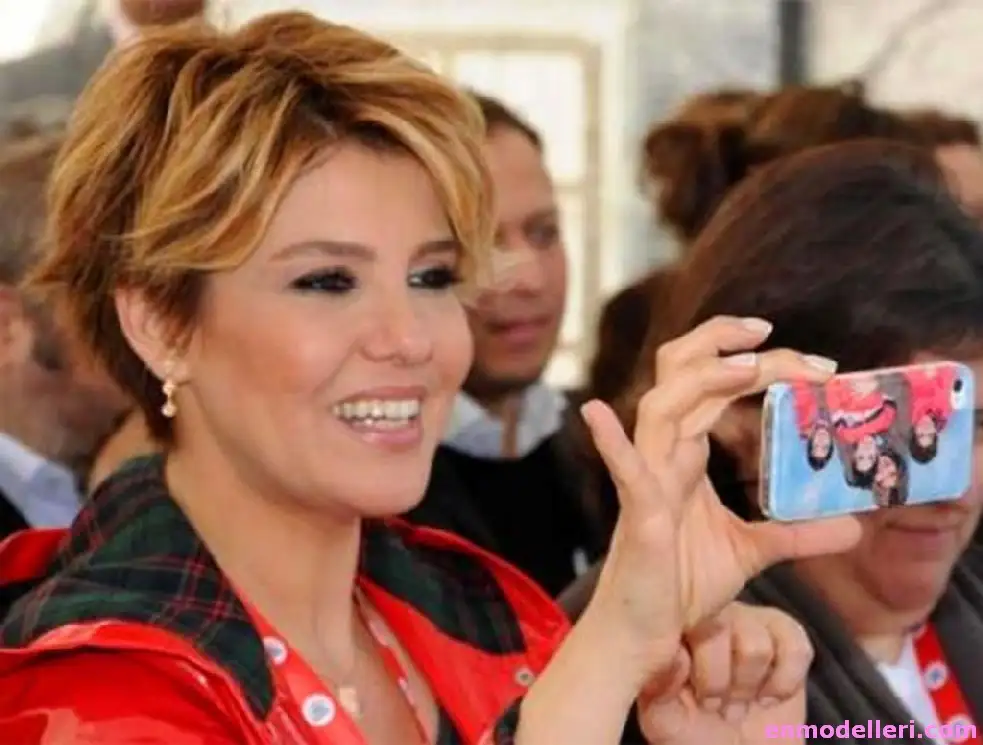 Gülben-ergen-kısa-saç-modelleri-2014.webp