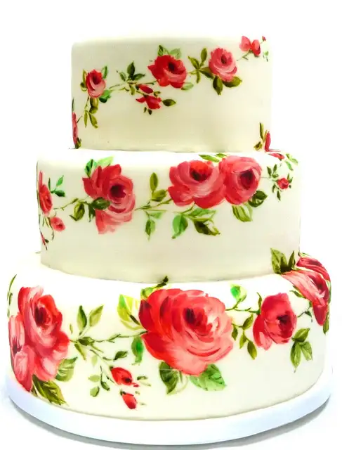 hand-painted-roses-wedding-cake.webp