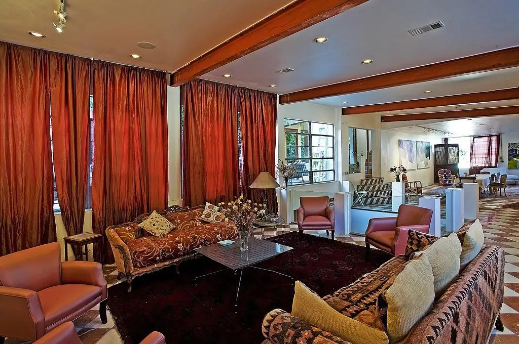 Low-beamed-ceilings-give-some-rooms-cozy-vibe.webp