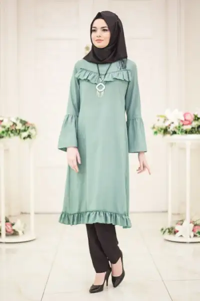 neva-style-firfir-detayli-volan-kol-cagla-yesili-tesettur-tunik-52210cy-30357-10-B.webp
