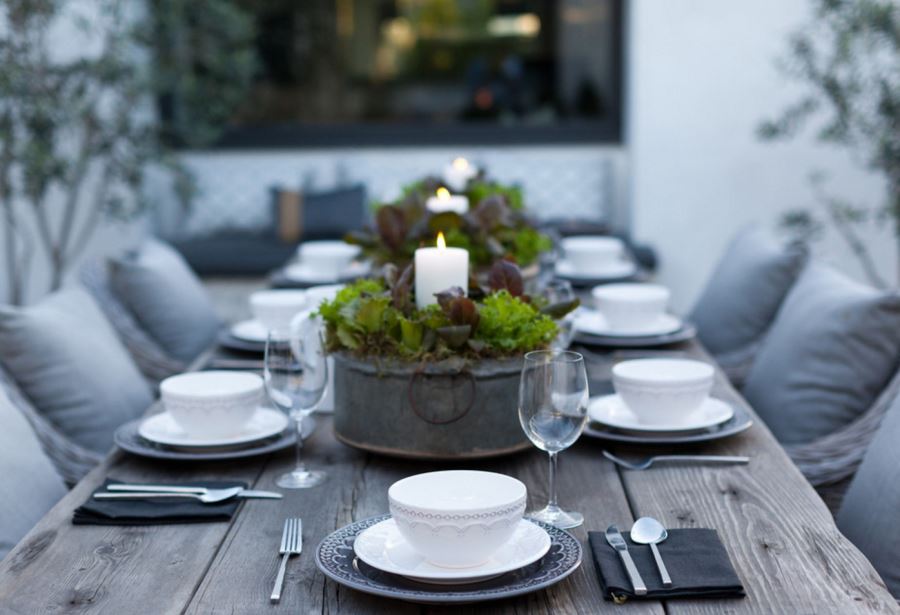 Outdoor-dining-table-with-candle-centerpieces.jpg