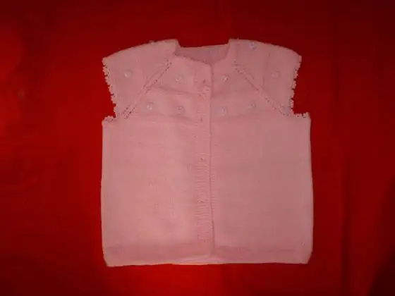 pembe-tek-şiş-örgülü-kız-bebek-yeleği-560x420.webp