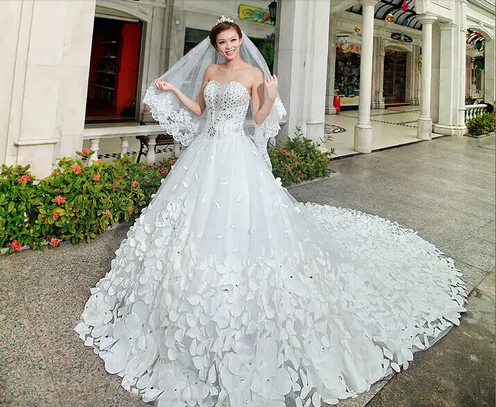 petals_flowers_leaves_3d_beaded_fairy_queen_white_bridal_gown_court_train_wedding_dress_2014.webp