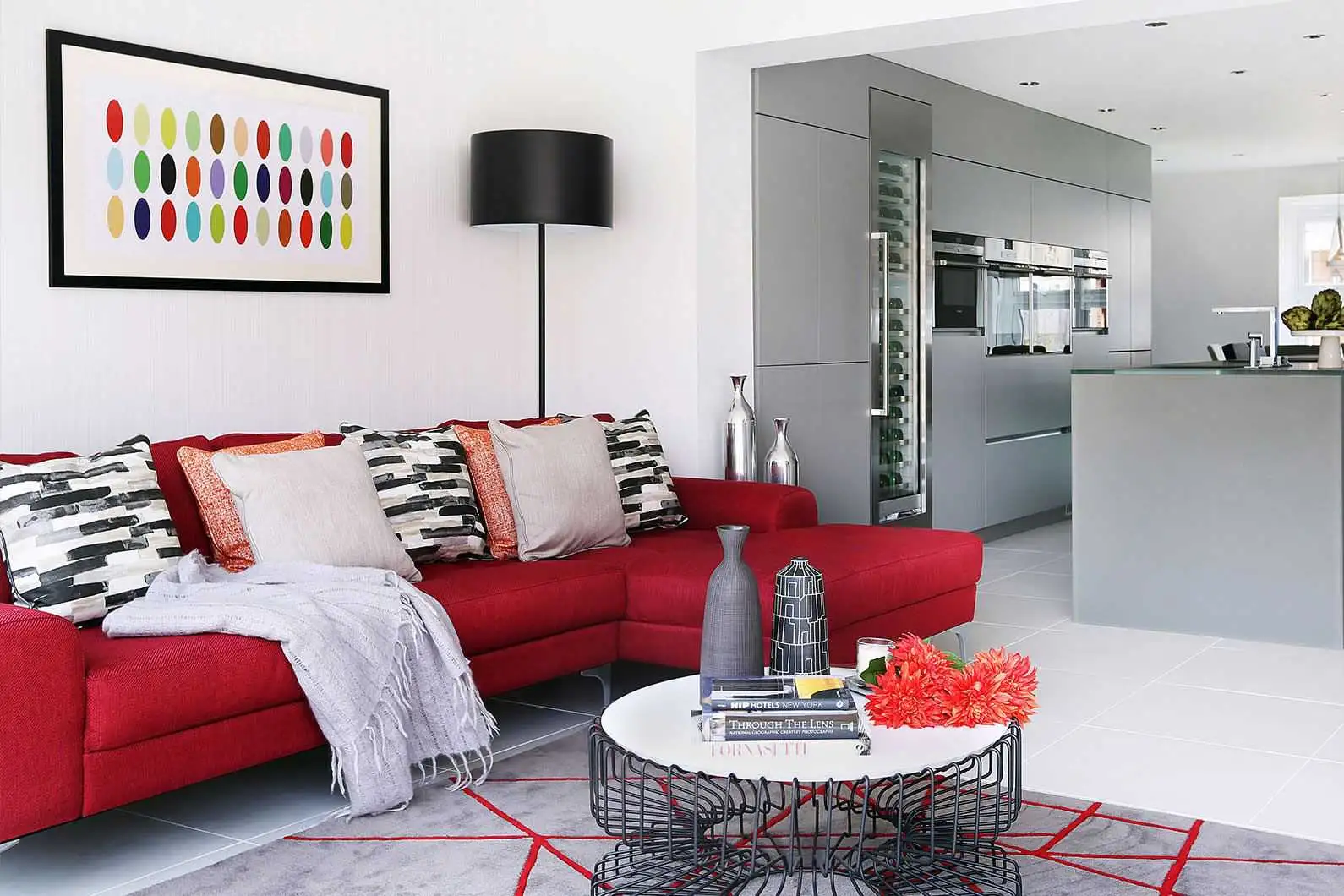 Red-sofa-gray-kitchen-5a19d18589eacc00373dc801.webp