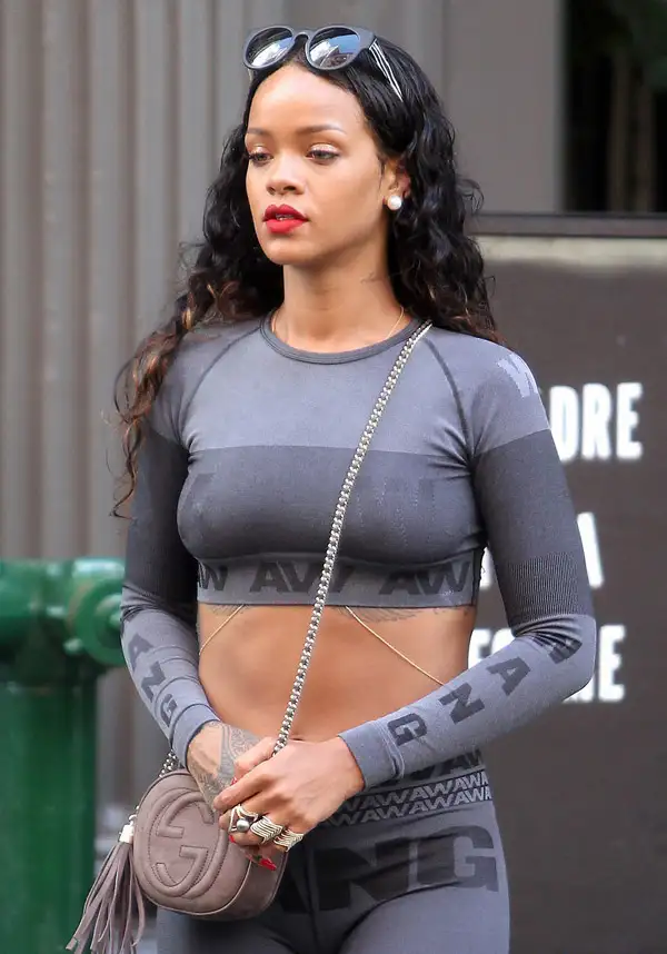 rihanna-plunging-white-suit-at-edun-fashion-show-06.webp
