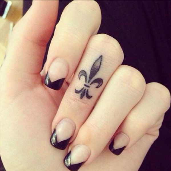 Smallest-Cool-Fleur-De-Lis-Tattoo-On-Girl-Finger.jpg