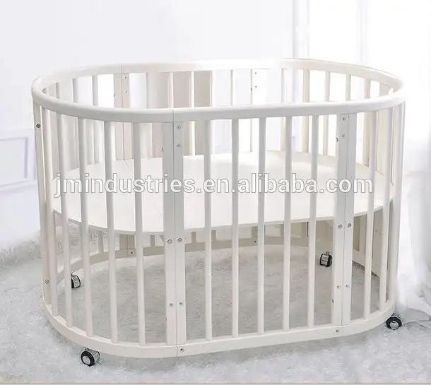 Solid-Wood-Round-Baby-Cot-portable-baby.webp
