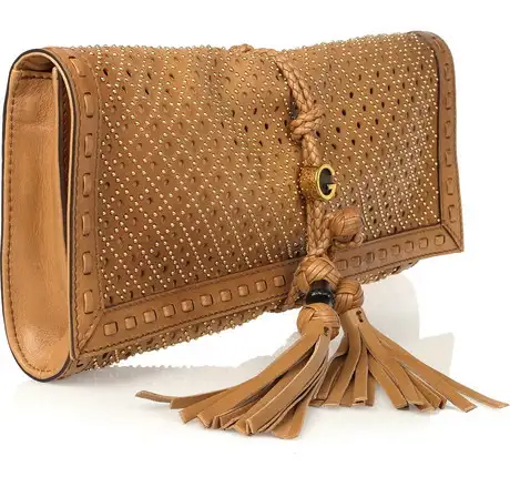 Studded-Leather-Clutch-by-Gucci-1.webp