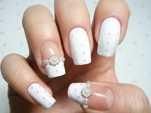 white-polka-bridal-nail-design.webp