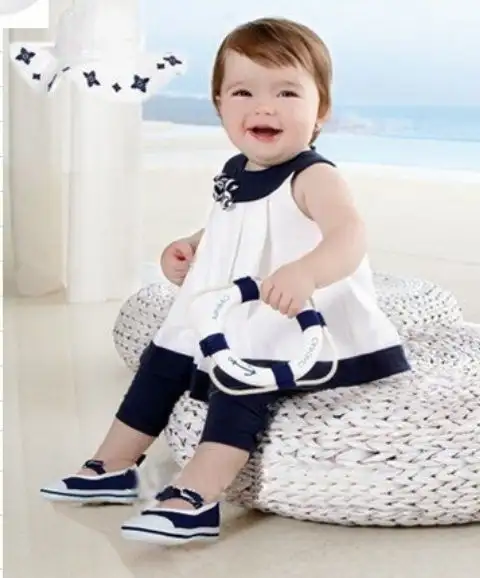 Yazlik-Siyah-Beyaz-Elbise-icinde-Yer-Alan-Kiz-Bebek_1ce3b.webp
