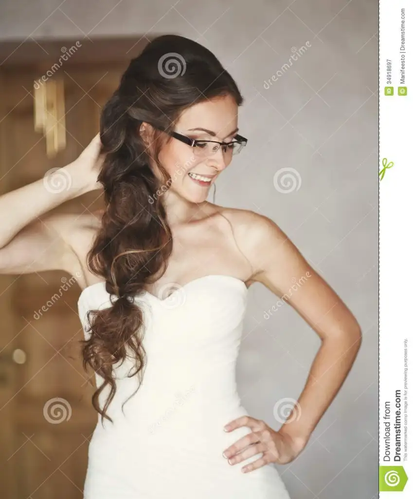 young-caucasian-bride-wearing-glasses-home-34918697.webp