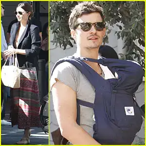 $miranda-kerr-orlando-bloom-flynn-step-out.webp