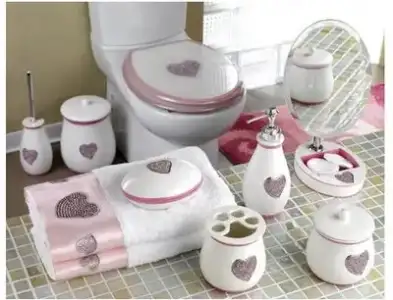$pembe-beyaz banyo aksesuarlari.webp