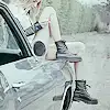 $Girl-on-car.webp