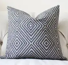 69a8212ef1320ee92c7012d419302ad1--geometric-pillow-designer-pillow.webp