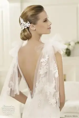 $manuel-mota-wedding-dresses-2013-gambia.webp
