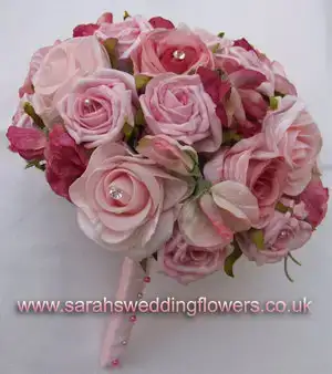 $pink_posy_with_pearls_diamante_by_sarahsweddingflowers.webp