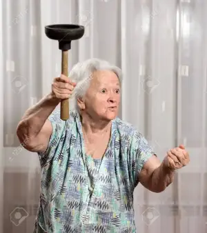 41387043-angry-old-woman-with-a-vantuz-at-home.webp