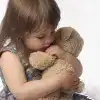 $little_girl_and_teddy.webp