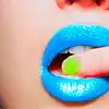 $blue_lips_green_nail.webp