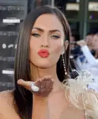 $megan-fox-blows-a-kiss.webp