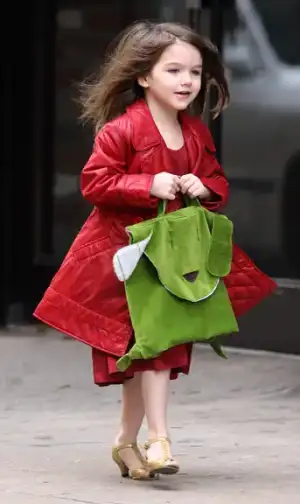 $suri-cruise-in-heels-again.webp