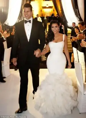 $kim-kardashian-reception-dress.webp