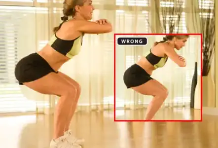 $webmd_photo_of_trainer_doing_squats.webp