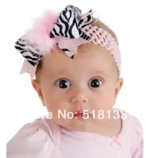 $Free-shipping-baby-boutique-elastic-feather-headbands-crochet-zebra-print-feather-fascinator...webp
