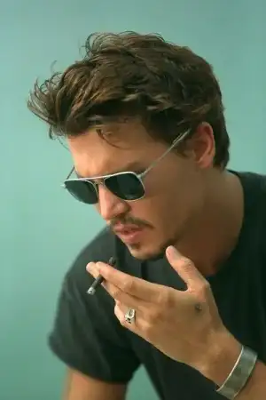 $Johnny-Deep-johnny-depp-7044800-750-1124.webp