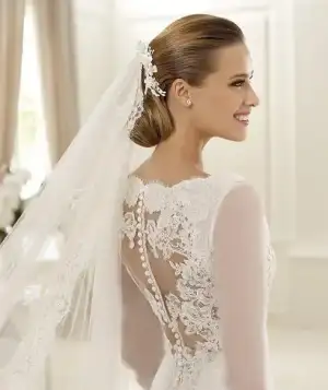 $Manuel-Mota-Spring-2013-Silhouette-Bridal-Dress-GANGES-a.webp