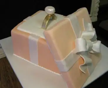 $Beautiful engagement cake with engagement ring theme.webp