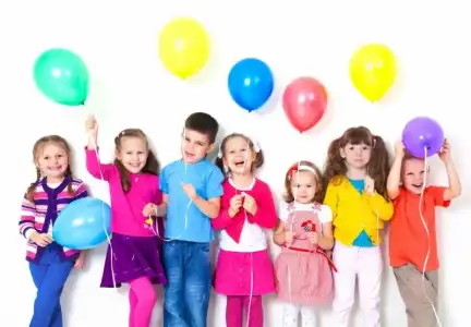 $Big-group-of-happy-children-with-balloons.webp