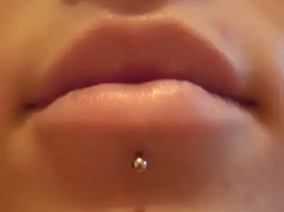 $hole-in-chin-piercing-2.webp