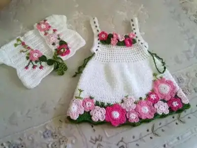 cicekli-kiz-bebek-elbisesi-ve-bolero-takimi.webp