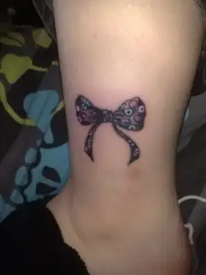 $Flirty-Bow-Tattoo-Designs-119.webp