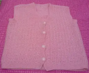 55.pembe yelek. 2-3 yas 4 tl.webp